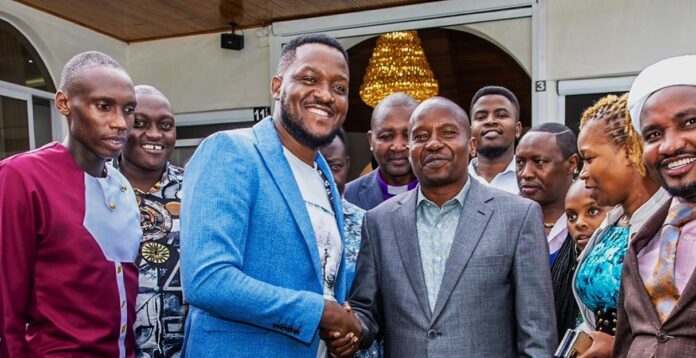Jose Gatutura greeting Kindiki2