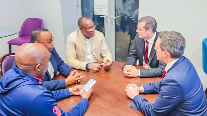 Owalo with Bournemouth Football Club officials